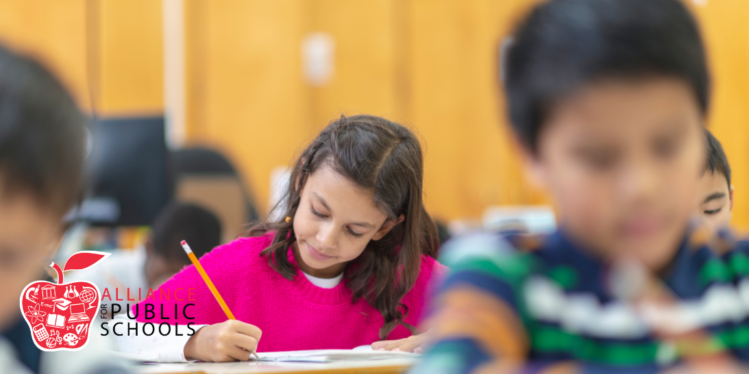 students at desks testing