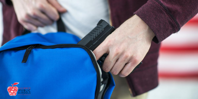 picture of gun in backpack