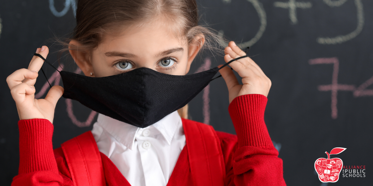 Girl with a mask and a backpack