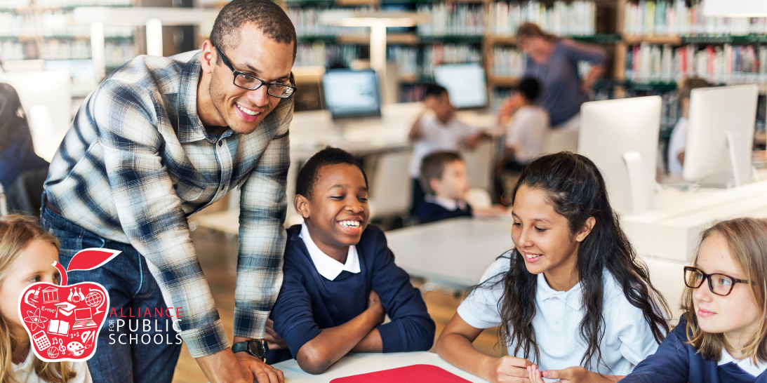 photo of teacher with students