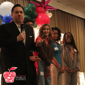 students on stage at GradNation